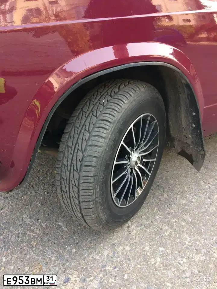 Фото автомобиля LADA 2104, 2004 — госномер Е953ВМ31. Цвет: КРАСНЫЙ