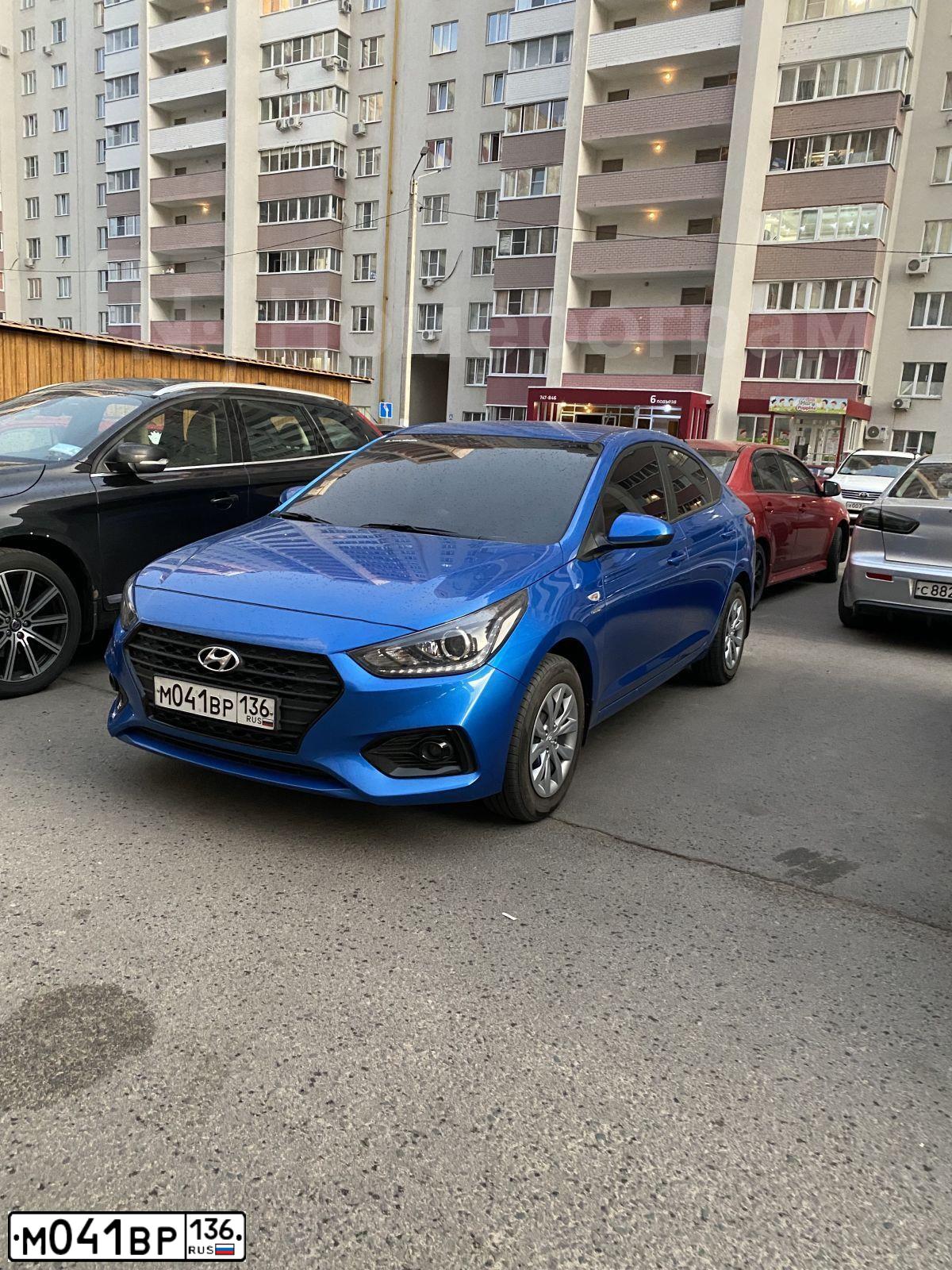 Фото автомобиля HYUNDAI SOLARIS, 2019 — госномер М041ВР136. Цвет: СИНИЙ