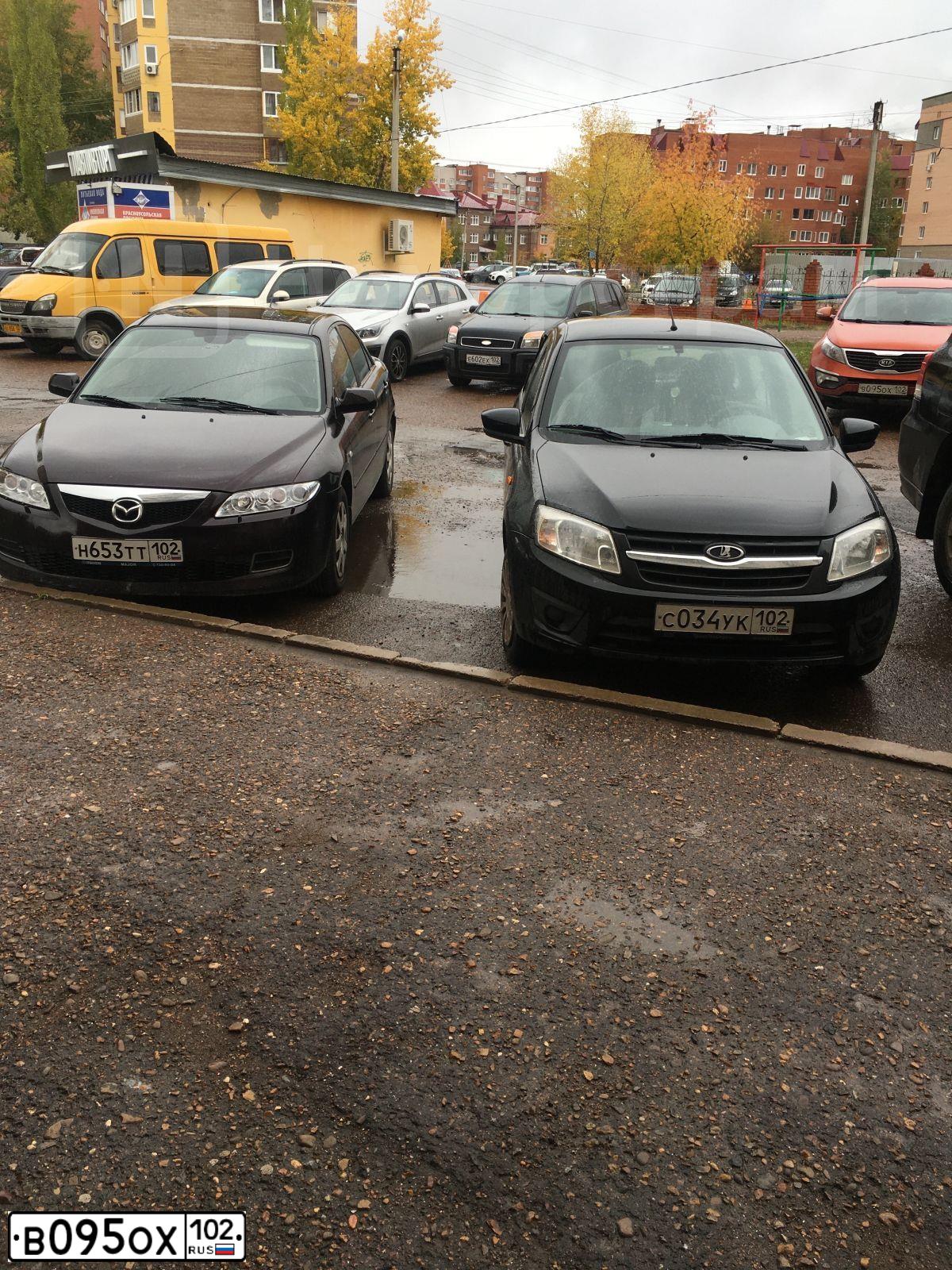 Фото автомобиля KIA SPORTAGE, 2010 — госномер В095ОХ102. Цвет: ОРАНЖЕВЫЙ