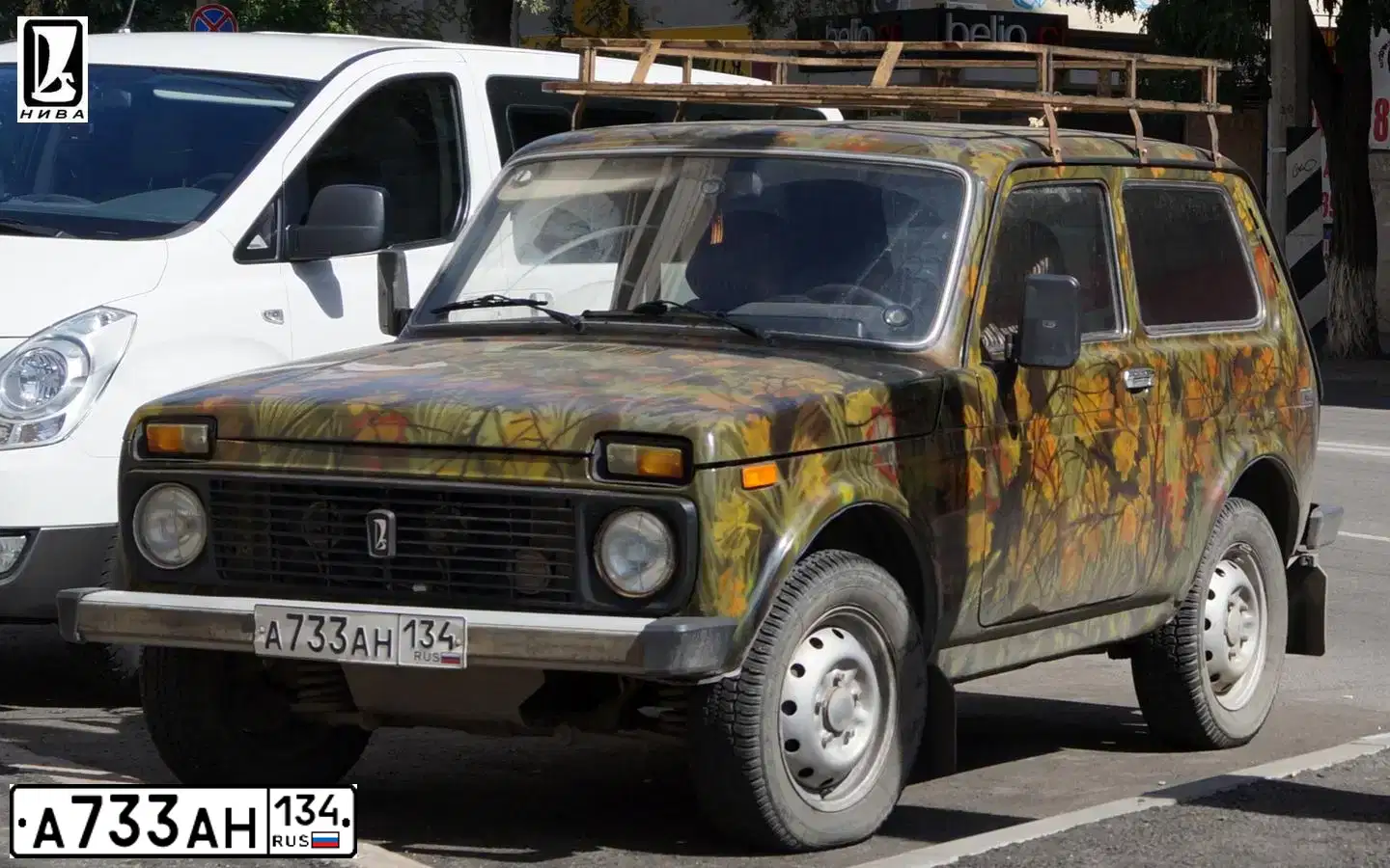 Фото автомобиля LADA 2121 NIVA, 2003 — госномер А733АН134. Цвет: ХАКИ
