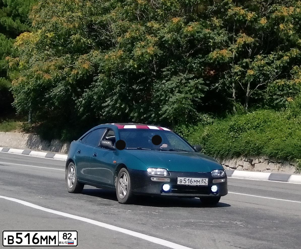 Фото автомобиля MAZDA 323, 1994 — госномер В516ММ82. Цвет: ЗЕЛЕНЫЙ