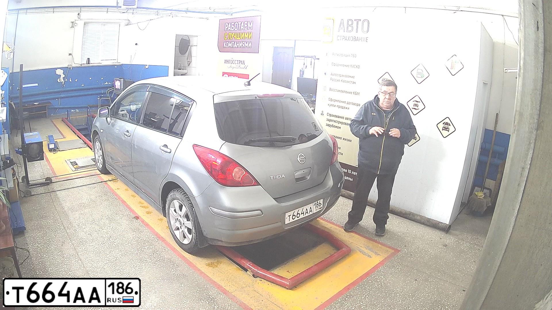 Фото автомобиля NISSAN TIIDA, 2012 — госномер Т664АА186. Цвет: СЕРЫЙ