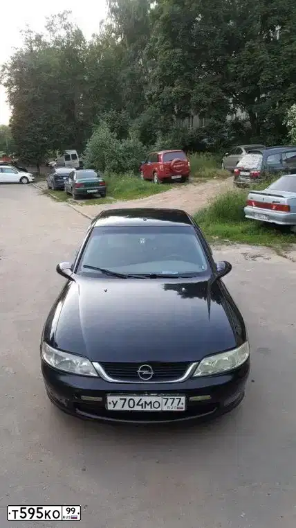 Фото автомобиля AZLK MOSKWITSCH 2141, 1999 — госномер Т595КО99. Цвет: СИНИЙ