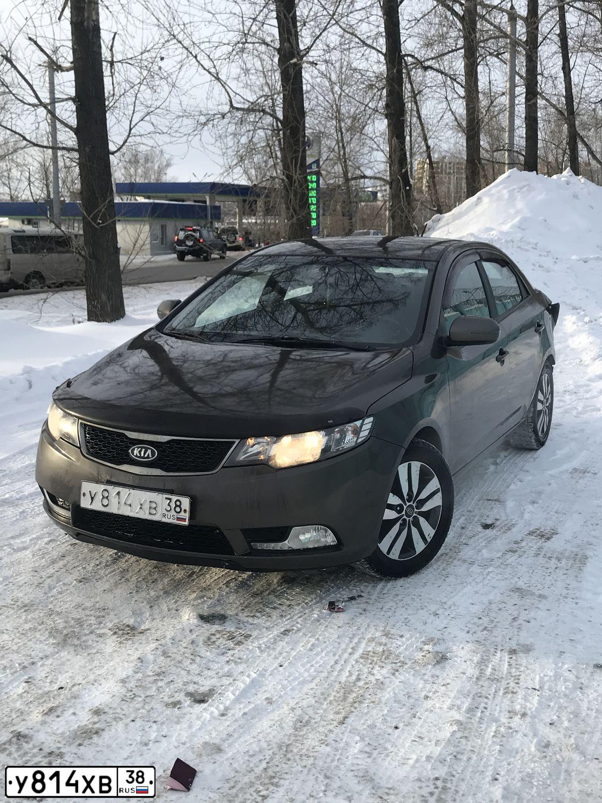 Фото автомобиля KIA CERATO, 2012 — госномер В543НР138. Цвет: БЕЖЕВЫЙ