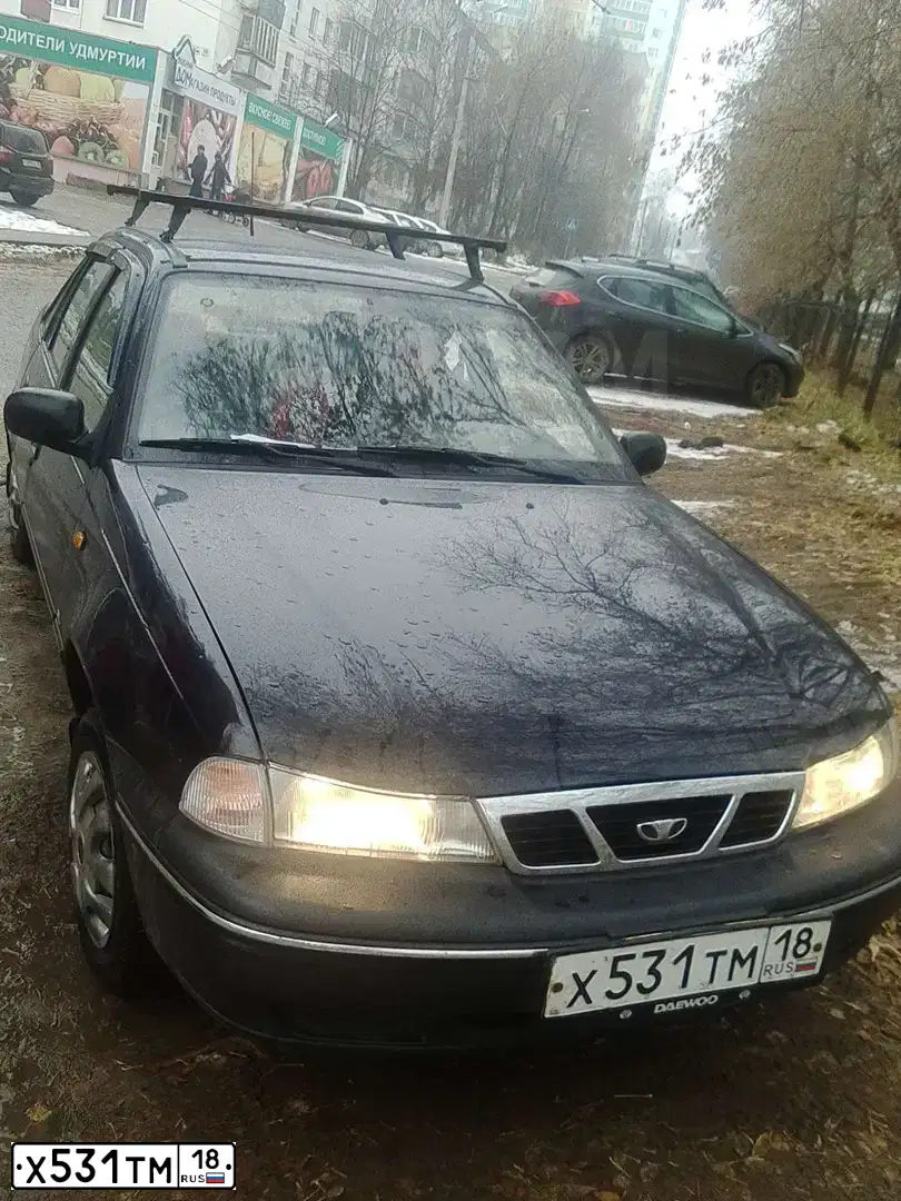 Фото автомобиля DAEWOO NEXIA, 2007 — госномер Х531ТМ18. Цвет: ТЕМНО-СИНИЙ