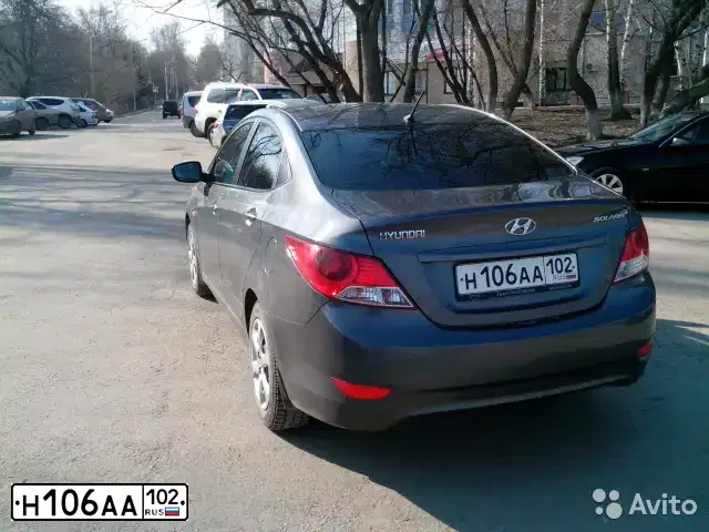 Фото автомобиля HYUNDAI SOLARIS, 2012 — госномер Н106АА102. Цвет: ЧЕРНО-СЕРЫЙ