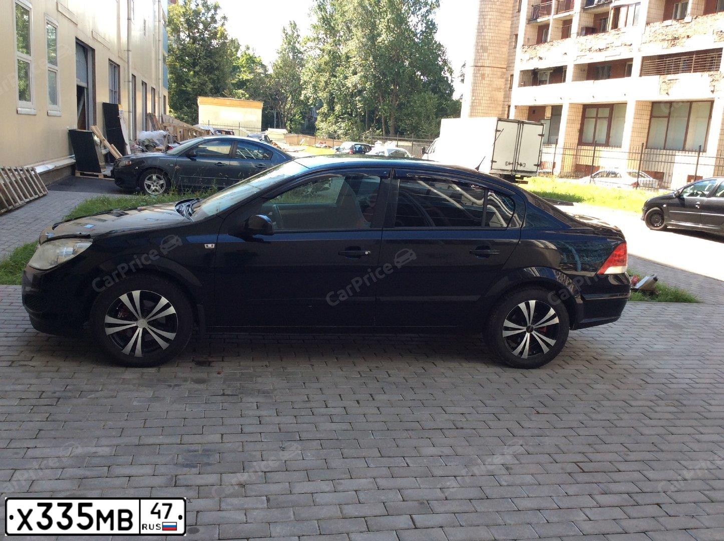 Фото автомобиля OPEL ASTRA, 2008 — госномер В067АК250. Цвет: ЧЕРНЫЙ