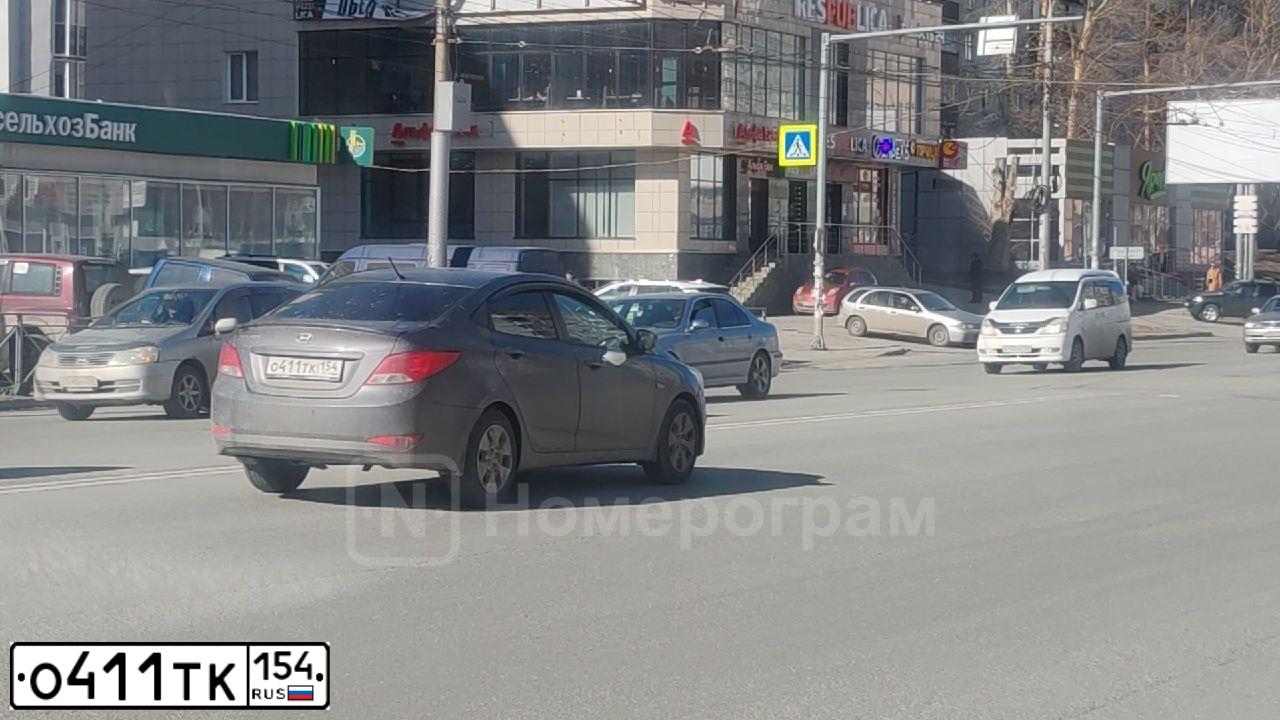 Фото автомобиля HYUNDAI SOLARIS, 2016 — госномер О411ТК154. Цвет: ТЕМНО-СЕРЫЙ