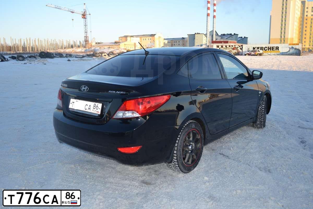 Фото автомобиля MITSUBISHI L 200, 2007 — госномер Т776СА86. Цвет: ЧЕРНЫЙ