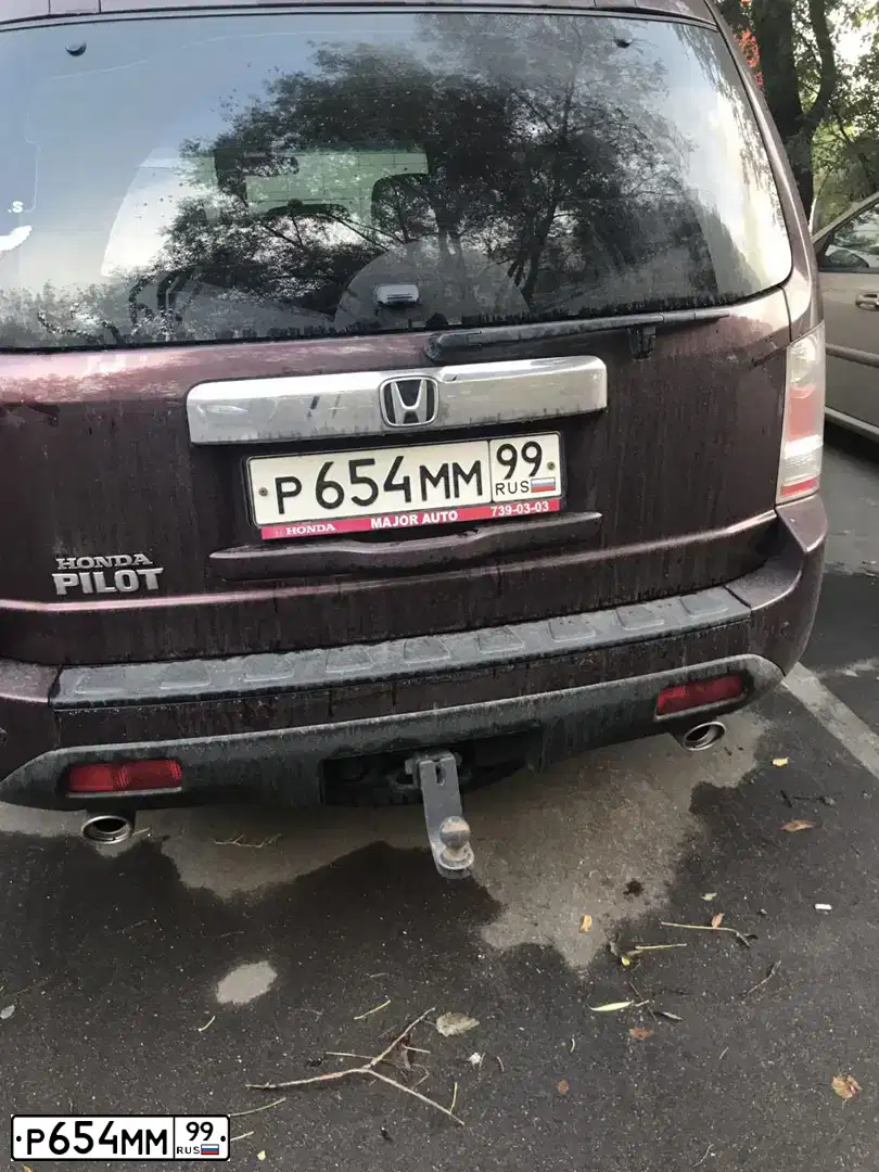 Фото автомобиля HONDA PILOT, 2012 — госномер Р654ММ99. Цвет: КРАСНЫЙ ТЕМНЫЙ
