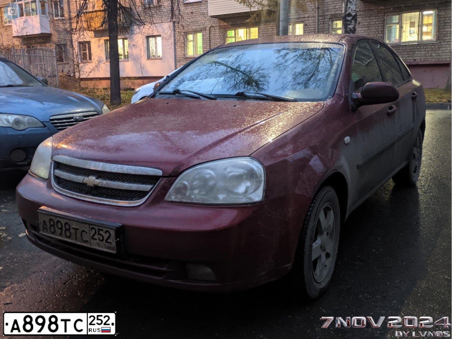 Фото автомобиля CHEVROLET LACETTI, 2009 — госномер А898ТС252. Цвет: Красный