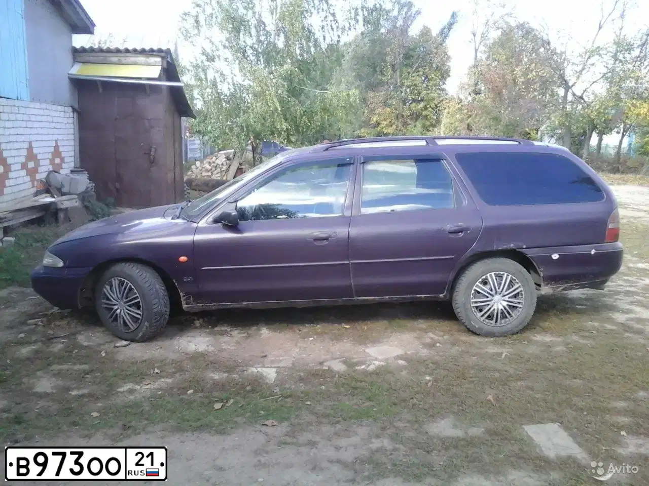 Фото автомобиля LADA 1117 KALINA, 2012 — госномер В973ОО21. Цвет: СЕРО-СИНИЙ