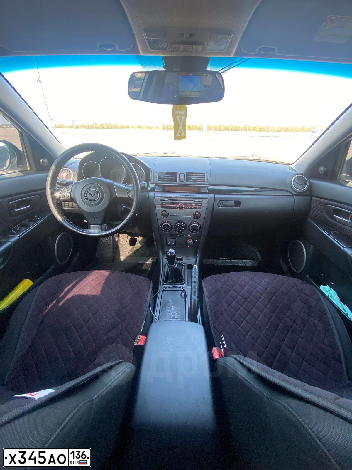 Фото автомобиля MAZDA 3, 2007 — госномер Х878ТЕ36. Цвет: СЕРО-ЗОЛОТИСТЫЙ