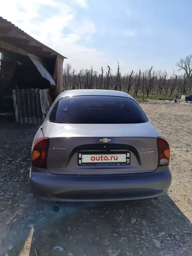 Фото автомобиля CHEVROLET LANOS, 2007 — госномер Н682РХ82. Цвет: СЕРЫЙ