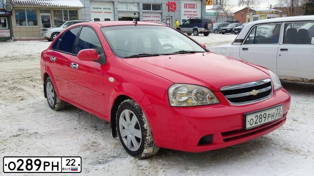 Фото автомобиля CHEVROLET LACETTI, 2008 — госномер К245НЕ142. Цвет: Красный