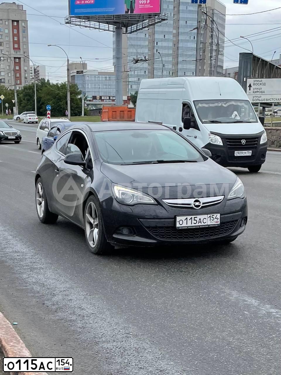 Фото автомобиля OPEL ASTRA, 2011 — госномер О115АС154. Цвет: ЧЕРНЫЙ