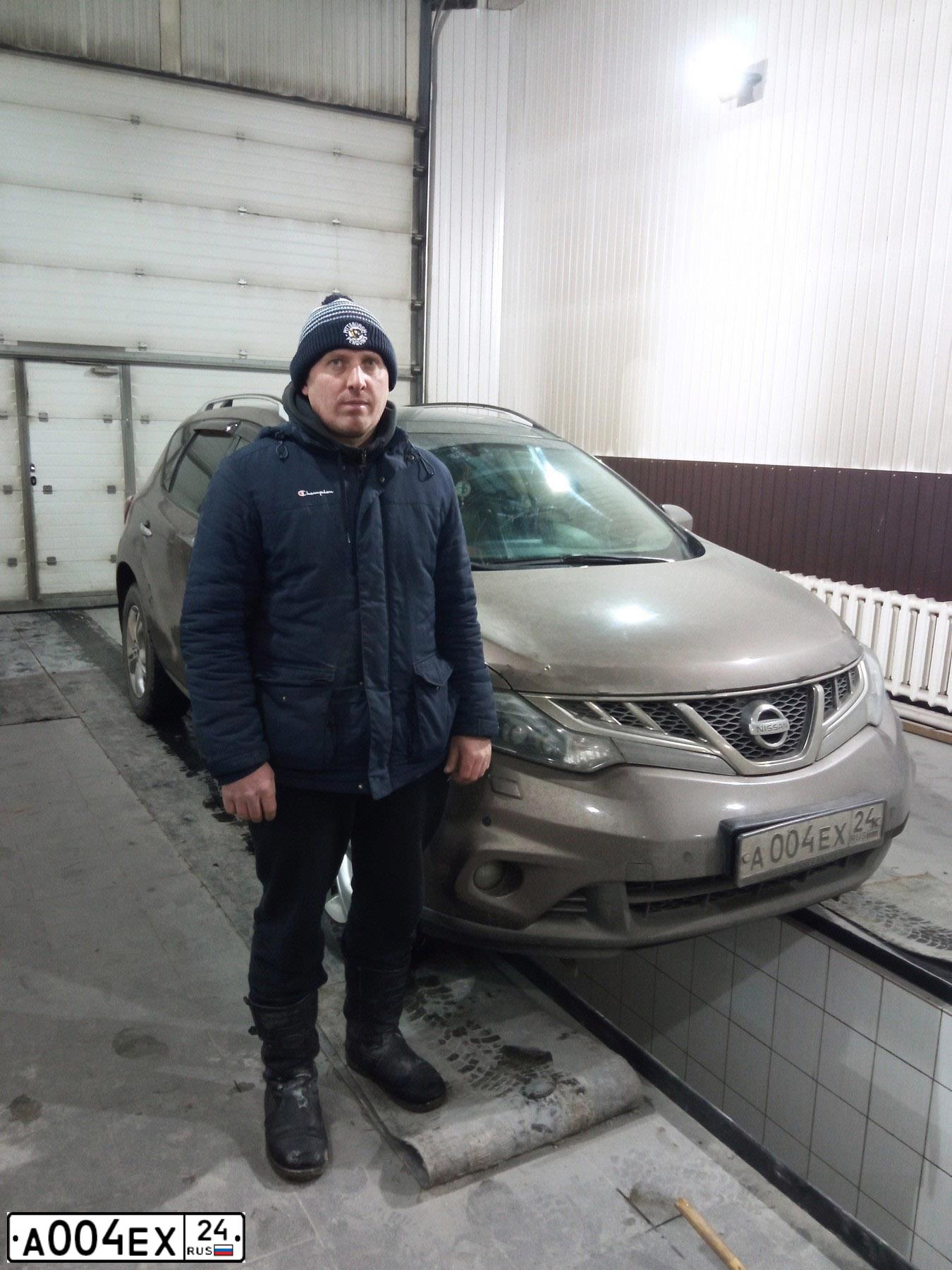 Фото автомобиля MITSUBISHI OUTLANDER, 2010 — госномер Е709НК124. Цвет: БЕЛЫЙ