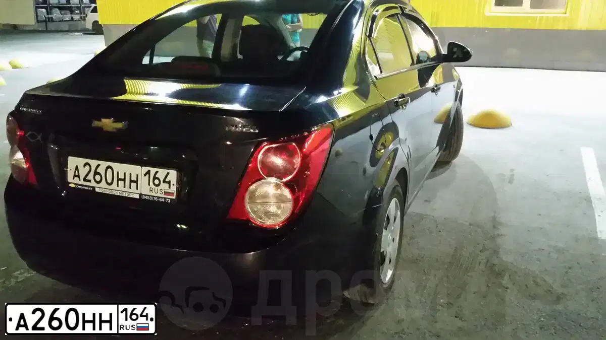 Фото автомобиля CHEVROLET AVEO, 2014 — госномер А260НН164. Цвет: ЧЕРНЫЙ МЕТАЛЛИК