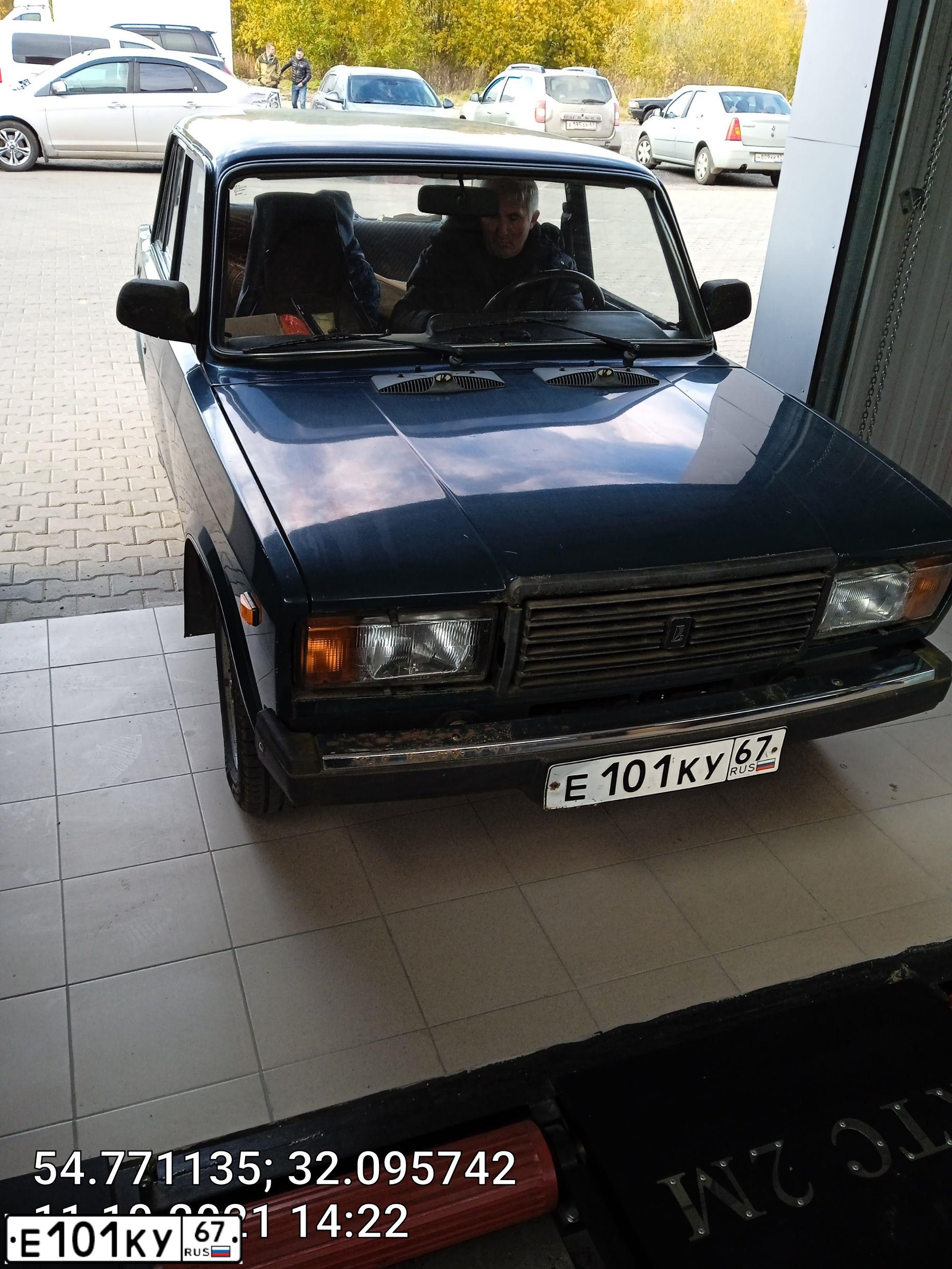 Фото автомобиля LADA 2107, 2009 — госномер Е101КУ67. Цвет: ТЕМНО-ЗЕЛЕНЫЙ