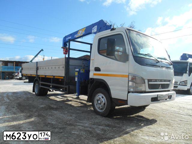 Фото автомобиля FUSO CANTER, 2012 — госномер Т949МС72. Цвет: Белый