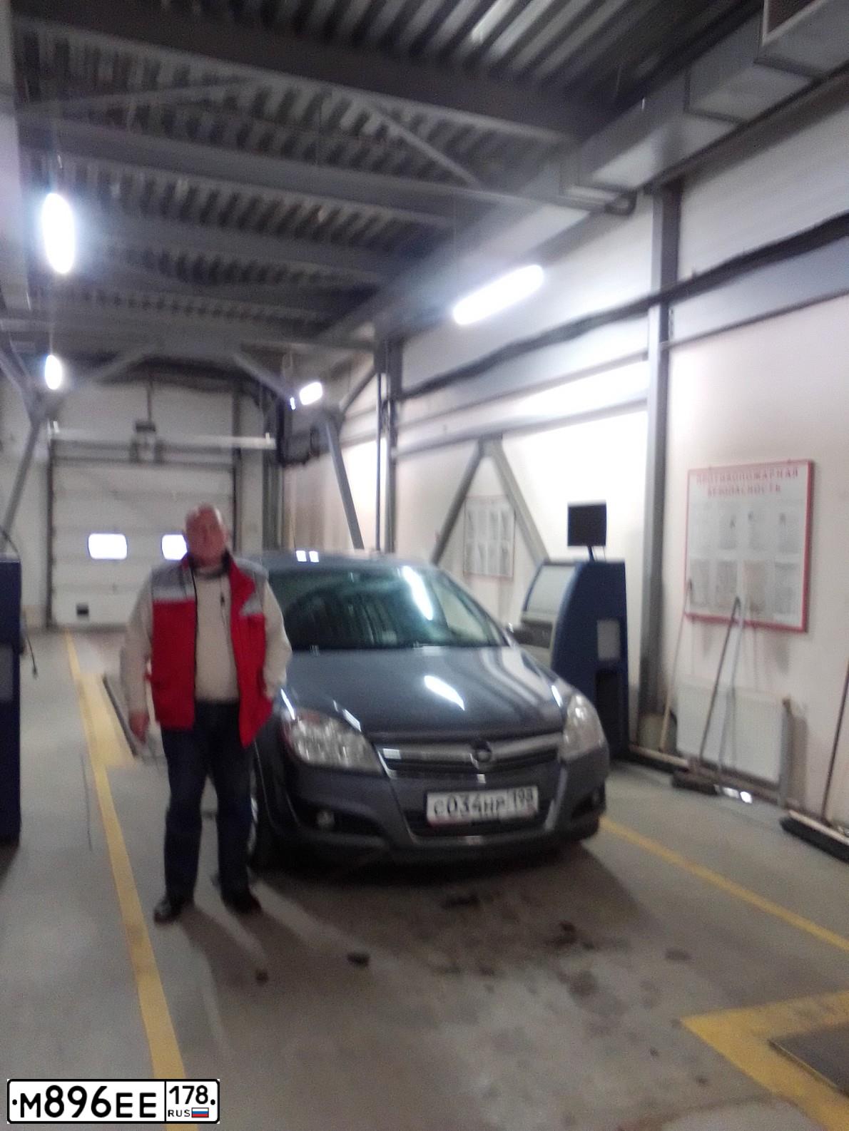 Фото автомобиля OPEL ASTRA, 2007 — госномер С034НР198. Цвет: СЕРЫЙ