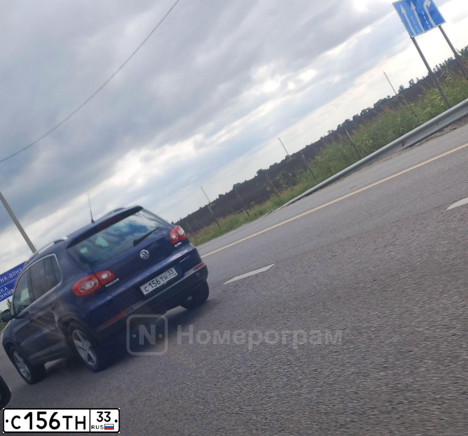Фото автомобиля VOLKSWAGEN TIGUAN, 2008 — госномер С156ТН33. Цвет: СИНИЙ ТЕМНЫЙ