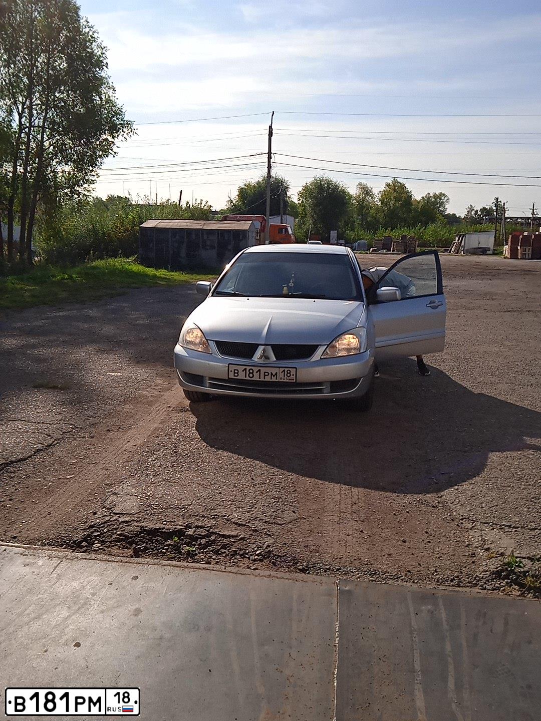 Фото автомобиля MITSUBISHI LANCER, 2005 — госномер В549МЕ761. Цвет: СВЕТЛО-СЕРЕБРИСТЫЙ  МЕТАЛЛИК