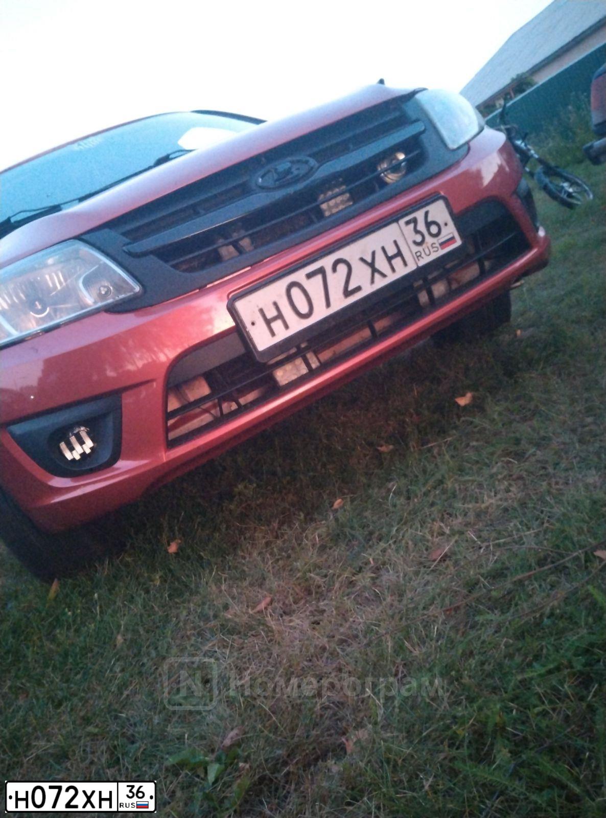 Фото автомобиля LADA 2190 GRANTA, 2013 — госномер Н072ХН36. Цвет: Оранжевый