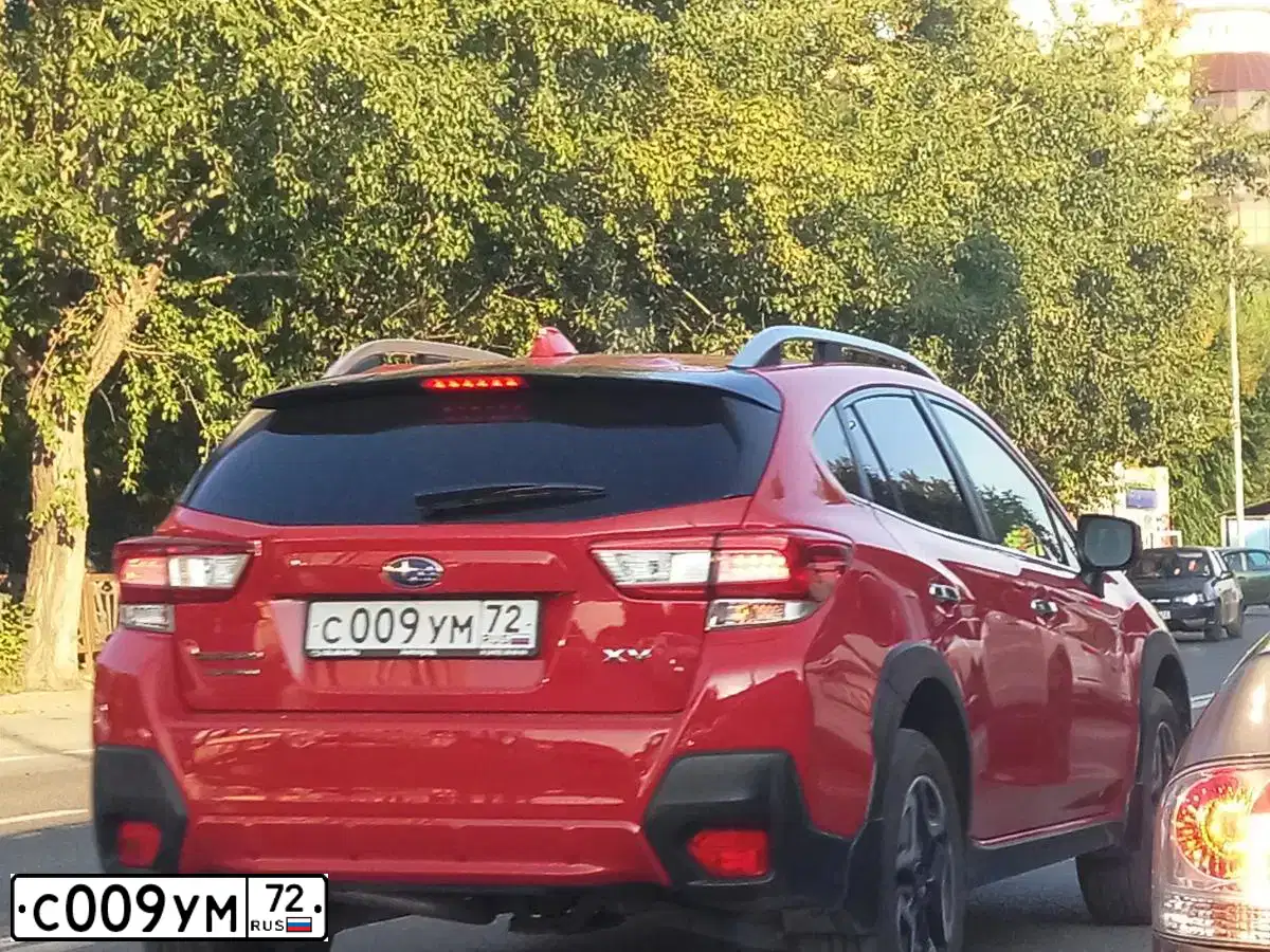 Фото автомобиля SUBARU XV, 2019 — госномер С009УМ72. Цвет: КРАСНЫЙ