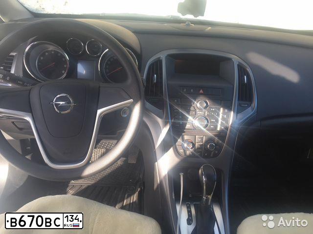 Фото автомобиля OPEL ASTRA, 2014 — госномер Е777НЕ52. Цвет: Белый