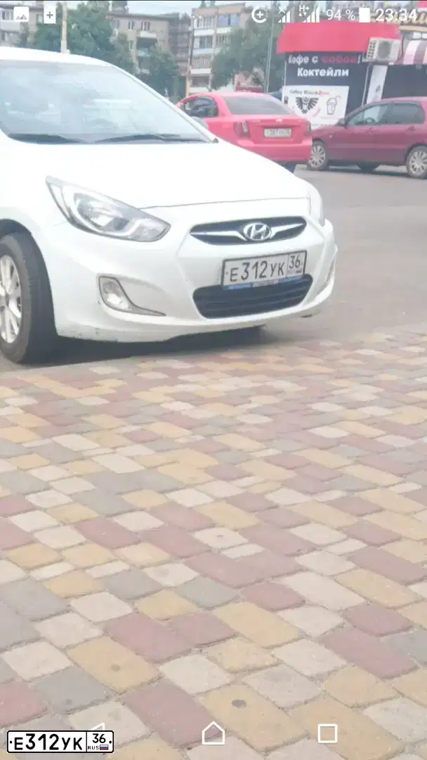 Фото автомобиля HYUNDAI SOLARIS, 2012 — госномер Е312УК36. Цвет: БЕЛЫЙ