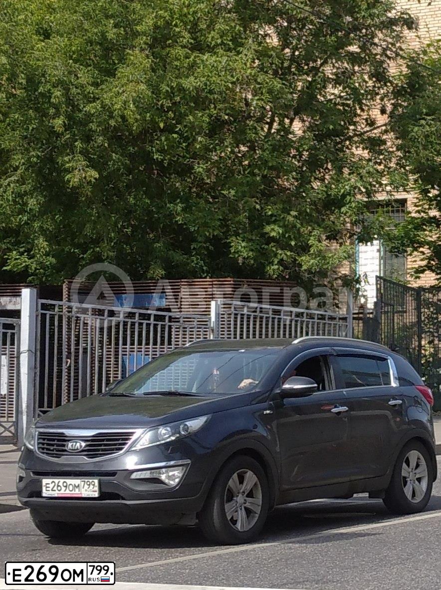 Фото автомобиля KIA SPORTAGE, 2013 — госномер Е269ОМ799. Цвет: ЧЕРНЫЙ