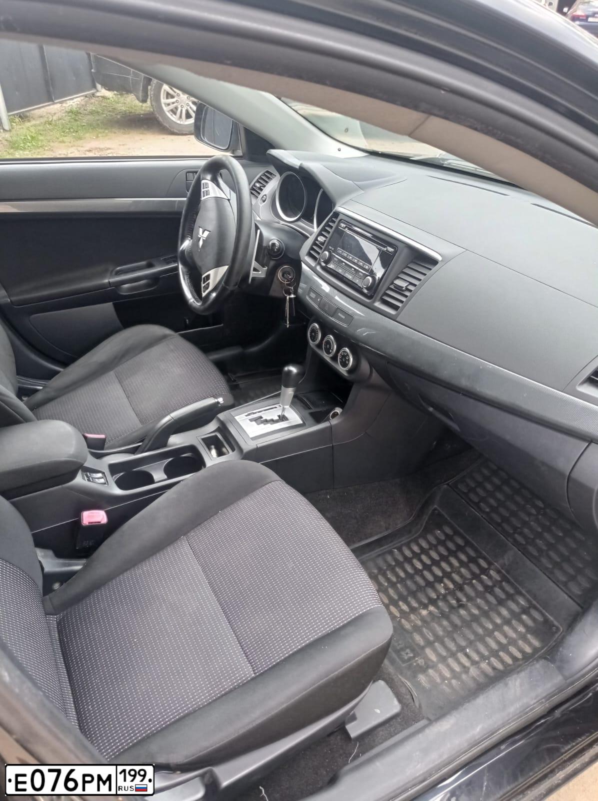 Фото автомобиля MITSUBISHI LANCER, 2008 — госномер А361ХЕ33. Цвет: ЧЕРНЫЙ