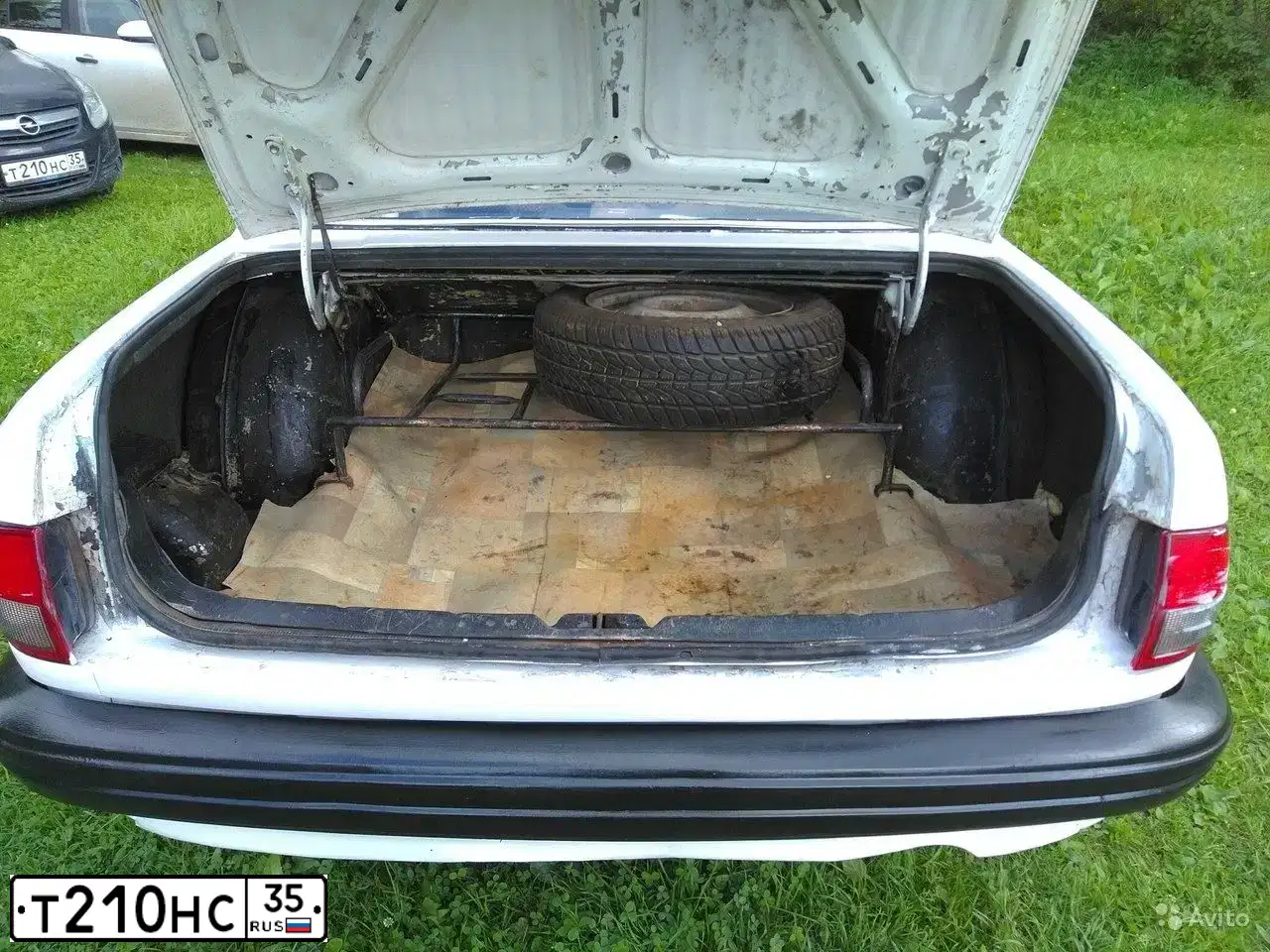 Фото автомобиля OPEL CORSA, 2007 — госномер Т210НС35. Цвет: ЧЕРНЫЙ