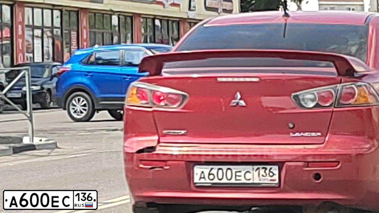 Фото автомобиля MITSUBISHI LANCER, 2013 — госномер А600ЕС136. Цвет: Красный