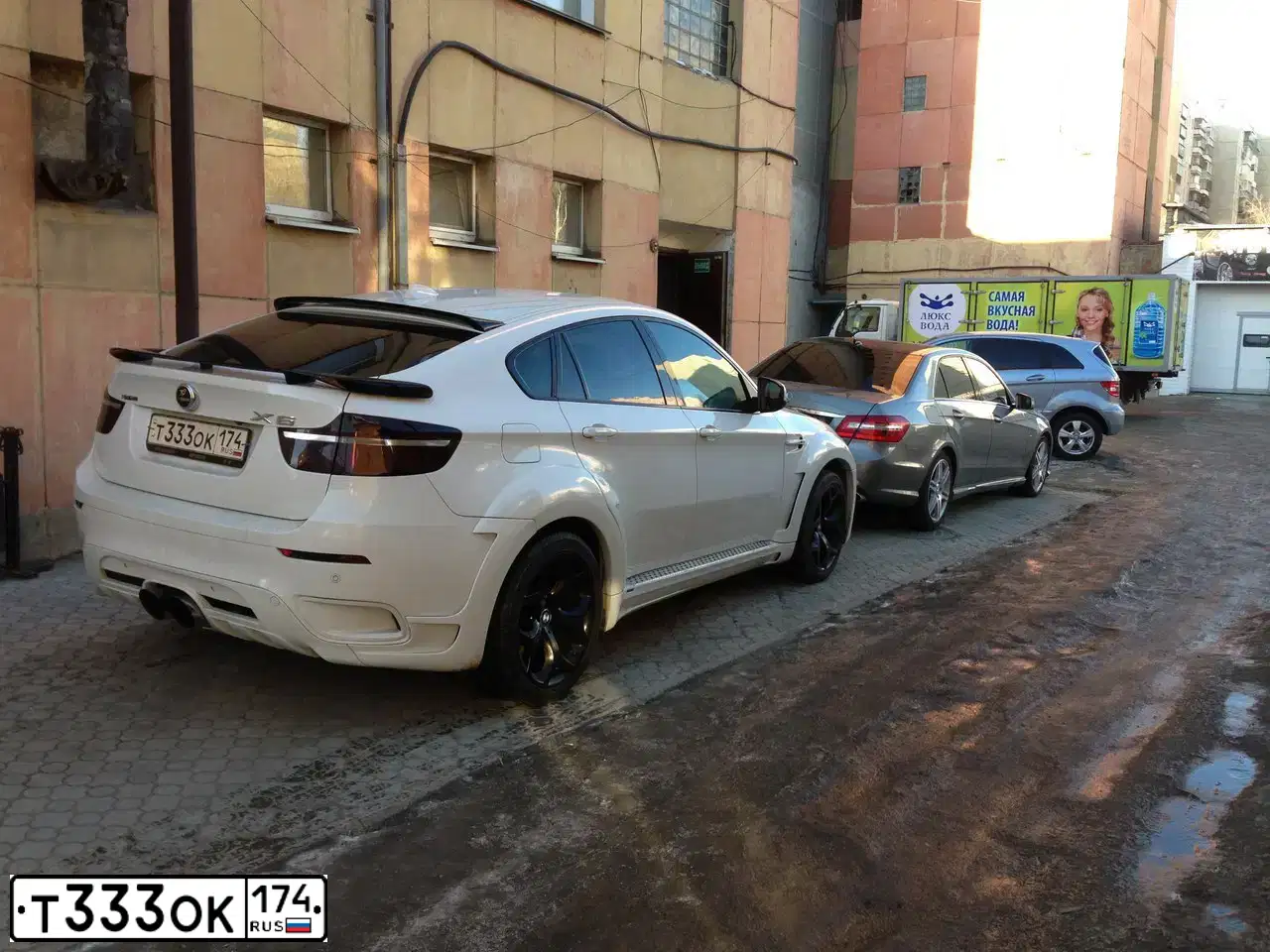 Фото автомобиля PORSCHE CAYENNE, 2008 — госномер У513ХТ55. Цвет: ЗЕЛЕНЫЙ