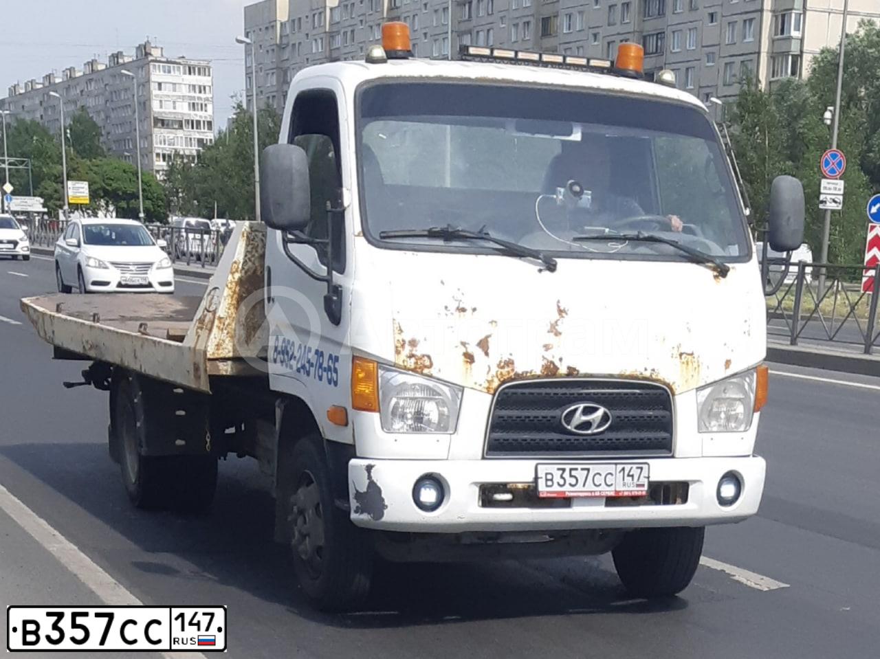 Фото автомобиля HYUNDAI MIGHTY, 2012 — госномер В357СС147. Цвет: Белый