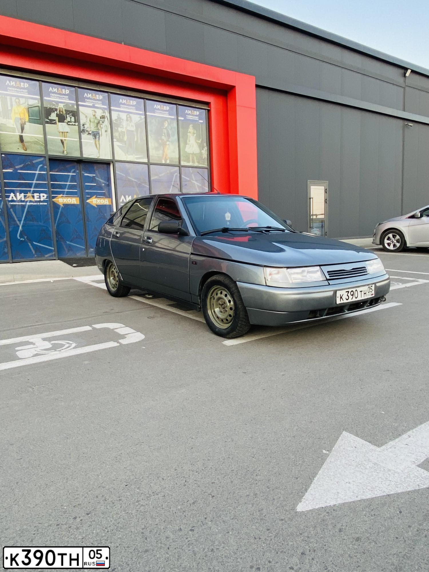 Фото автомобиля LADA 2112 LADA, 2007 — госномер К390ТН05. Цвет: СРЕДНИЙ СЕРО-ЗЕЛЕНЫЙ МЕТ