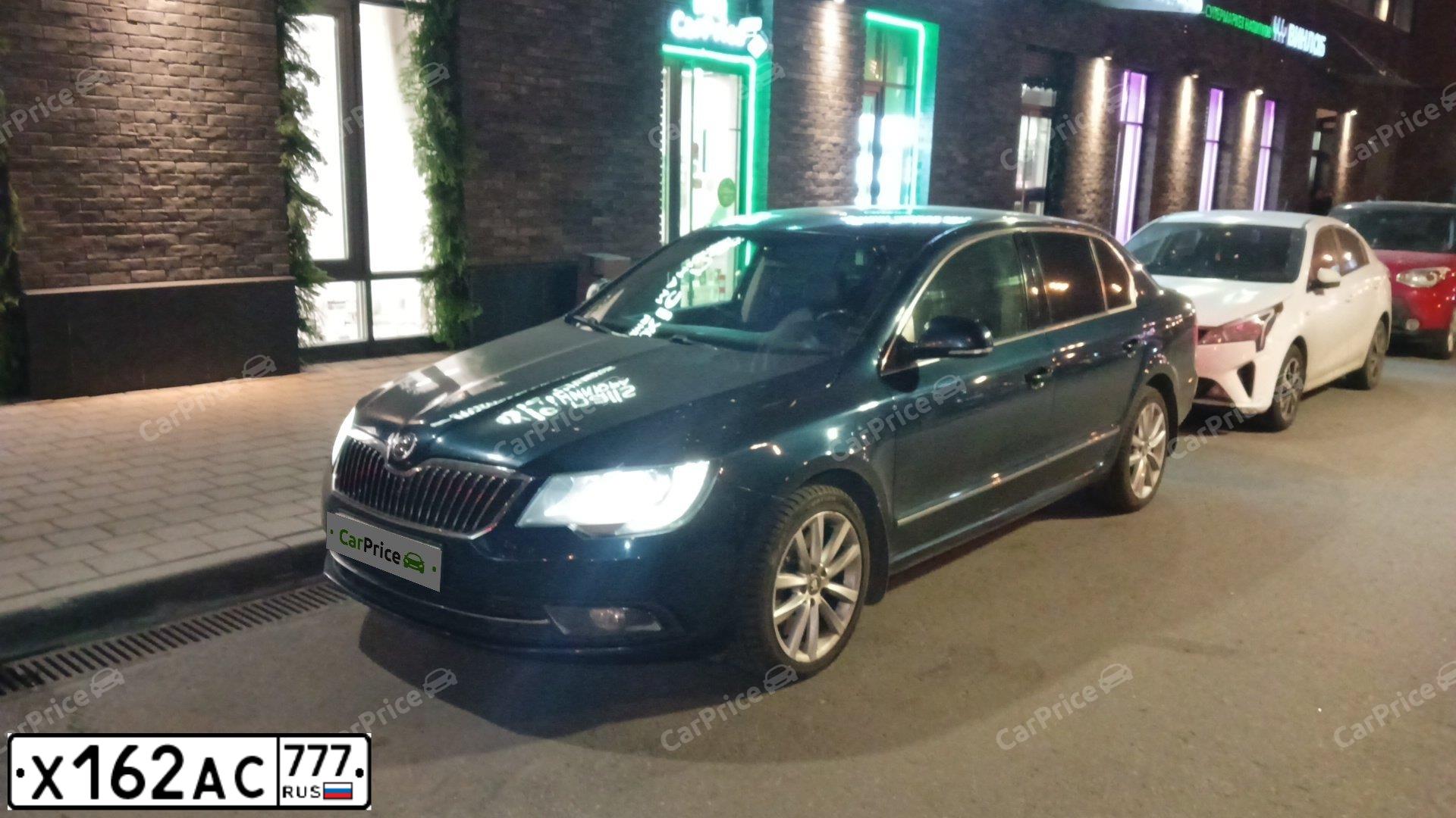 Фото автомобиля SKODA SUPERB, 2013 — госномер Р029РВ797. Цвет: синий