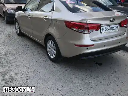 Фото автомобиля KIA RIO, 2015 — госномер Н830ОХ46. Цвет: БЕЖЕВЫЙ