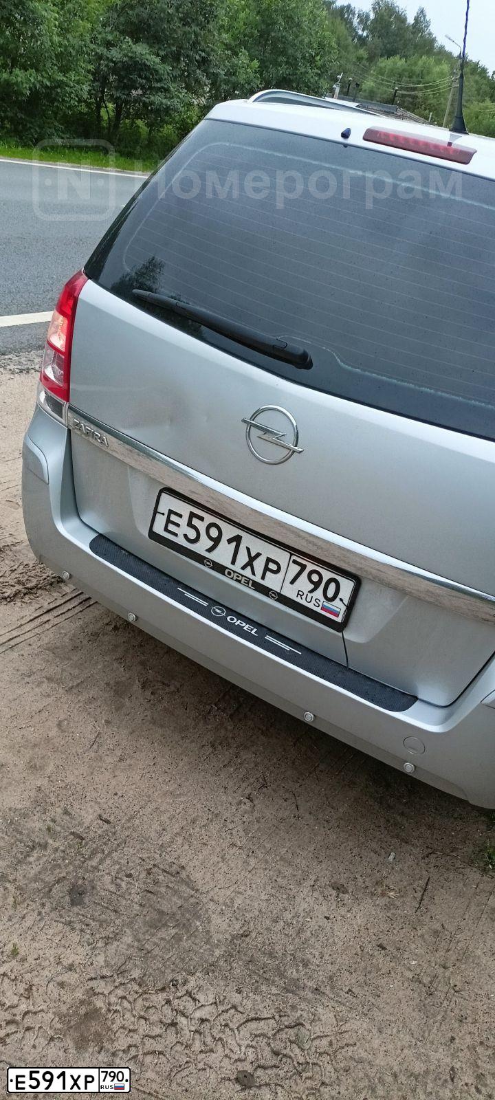 Фото автомобиля OPEL ZAFIRA, 2012 — госномер Е591ХР790. Цвет: Серый