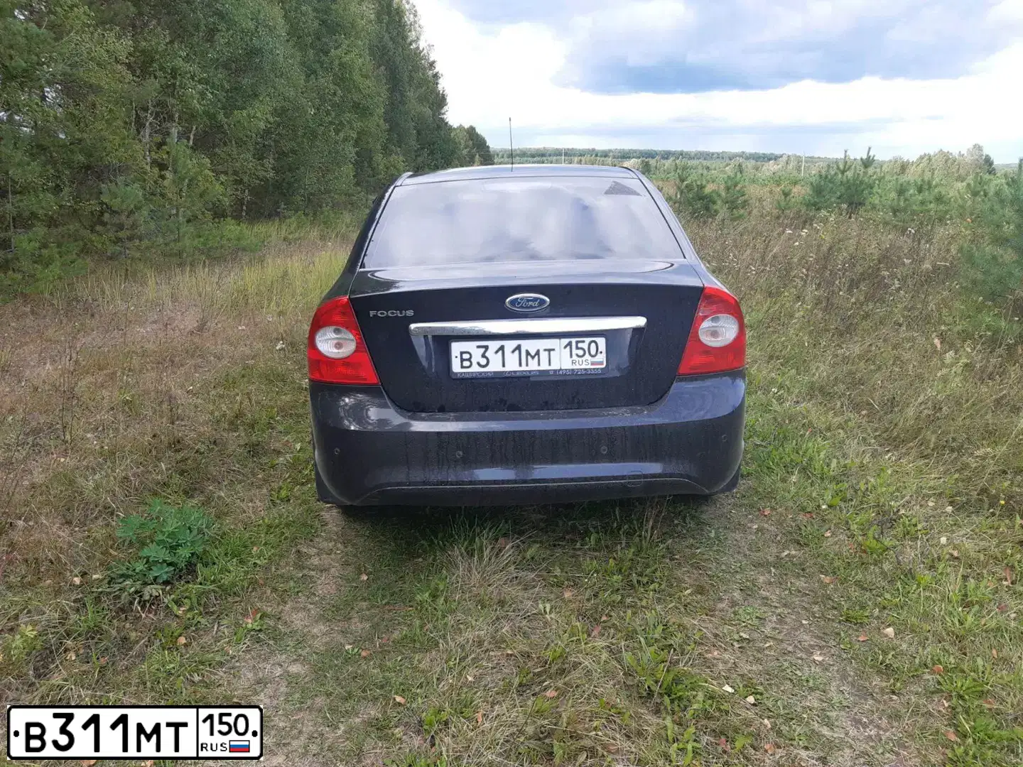 Фото автомобиля FORD FOCUS, 2009 — госномер В311МТ150. Цвет: ЧЕРНЫЙ