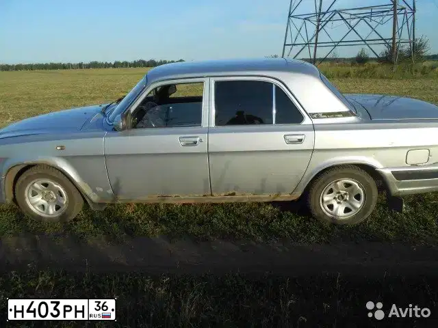 Фото автомобиля GAZ 3110 WOLGA, 2004 — госномер О036ВУ36. Цвет: БУРАН