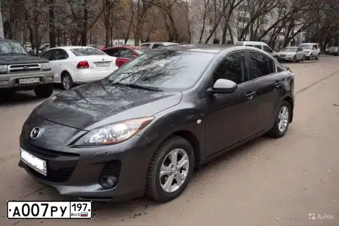 Фото автомобиля KIA RIO, 2013 — госномер А007РУ197. Цвет: Белый черный 