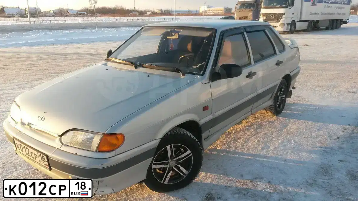 Фото автомобиля LADA 2115 SAMARA, 2005 — госномер К012СР18. Цвет: Серебристый