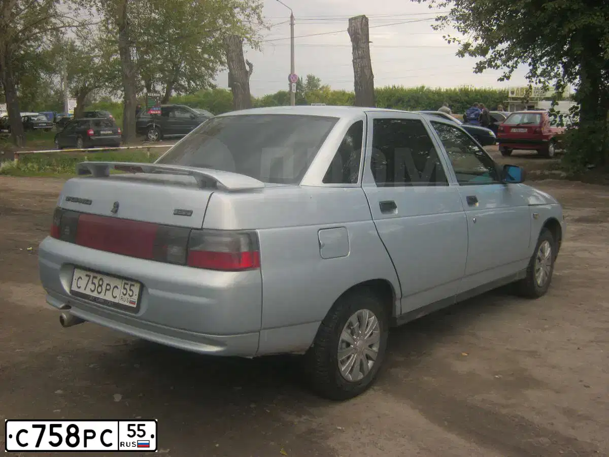 Фото автомобиля LADA 2110 LADA, 2004 — госномер У945РМ55. Цвет: Серебристо-Желтый