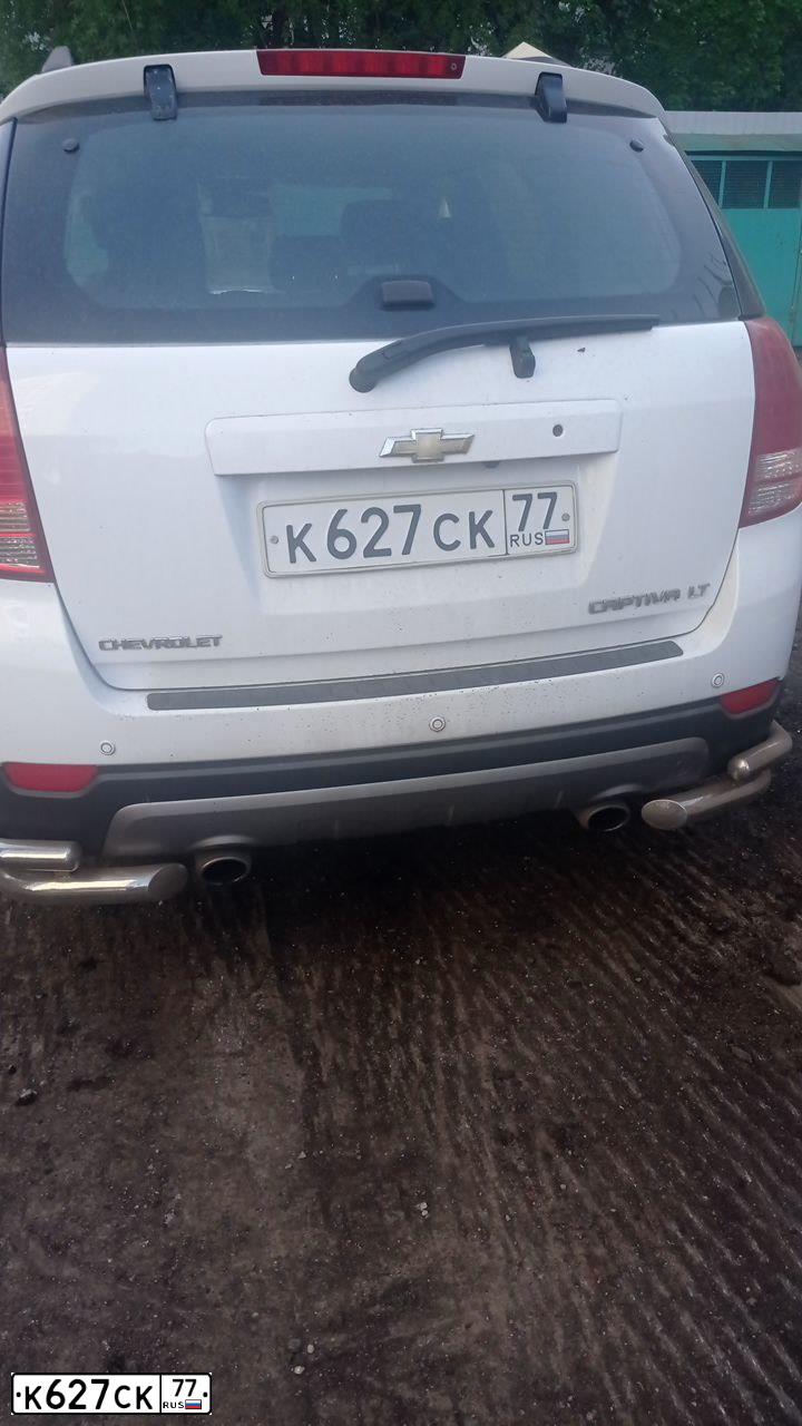 Фото автомобиля CHEVROLET CAPTIVA, 2012 — госномер К627СК77. Цвет: БЕЛЫЙ