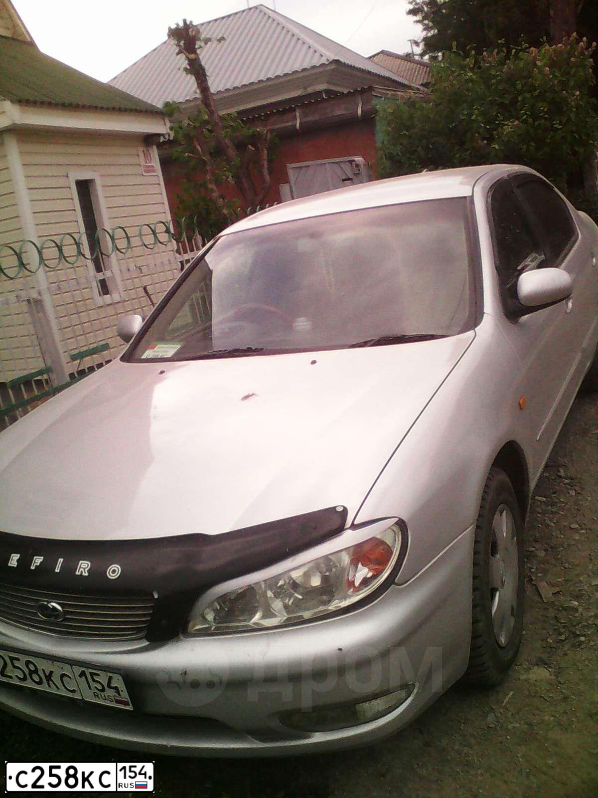 Фото автомобиля DAEWOO GENTRA, 2013 — госномер С258КС154. Цвет: СЕРО ПЕРЛАМУТРОВЫЙ