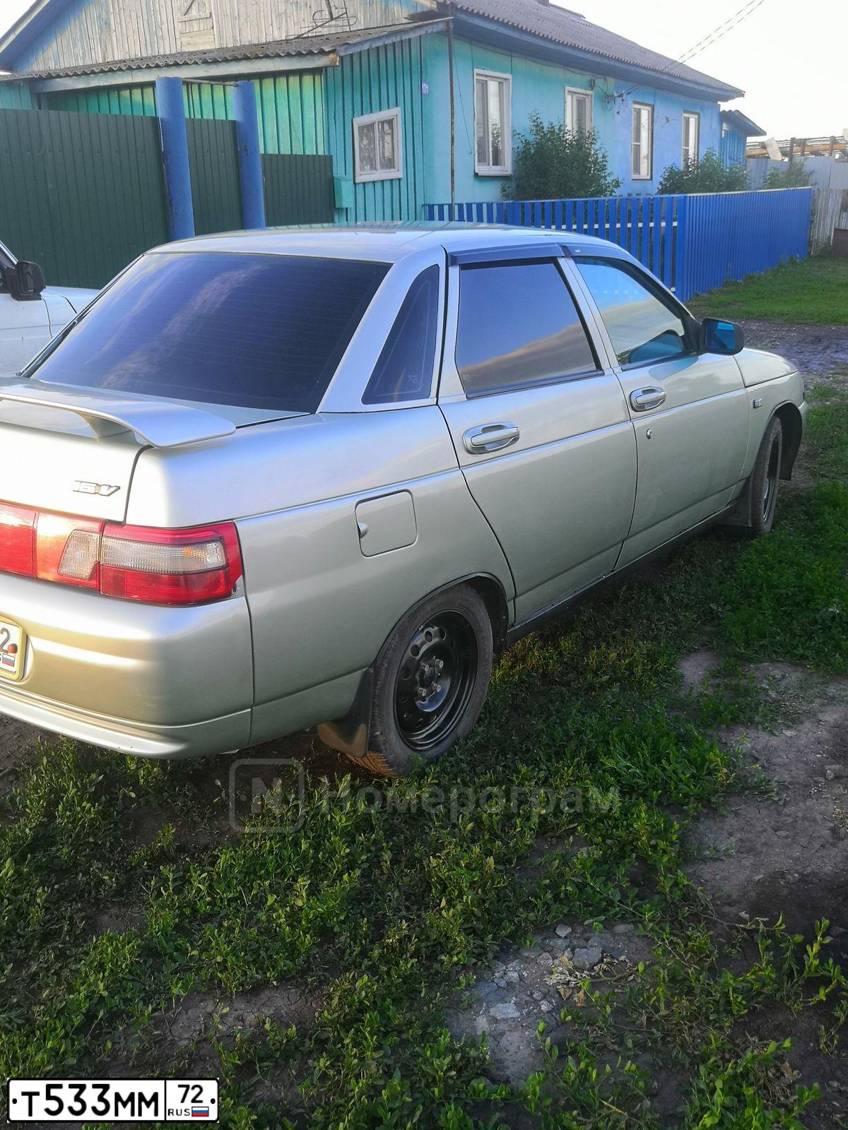 Фото автомобиля LADA 2110 LADA, 2006 — госномер Т533ММ72. Цвет: БЕЛО-ЗЕЛЕНЫЙ