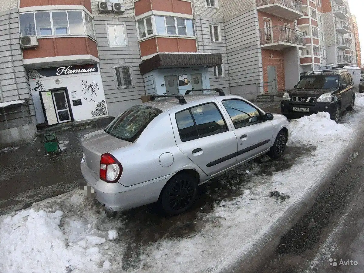 Фото автомобиля NISSAN X-TRAIL, 2007 — госномер О121МР77. Цвет: ЧЕРНЫЙ